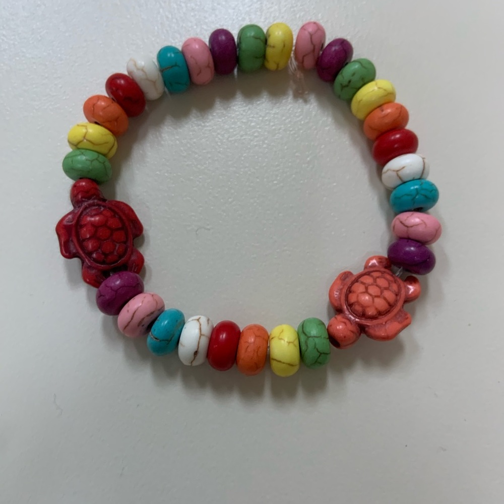 Trendy colorful sea turtle surfer bracelet